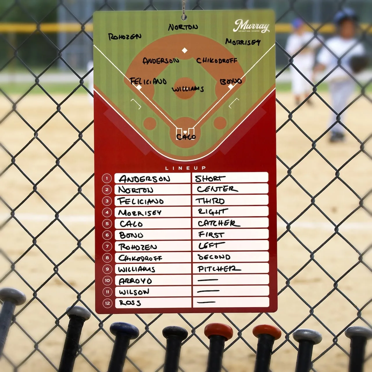 Clipboard on the fence at the field